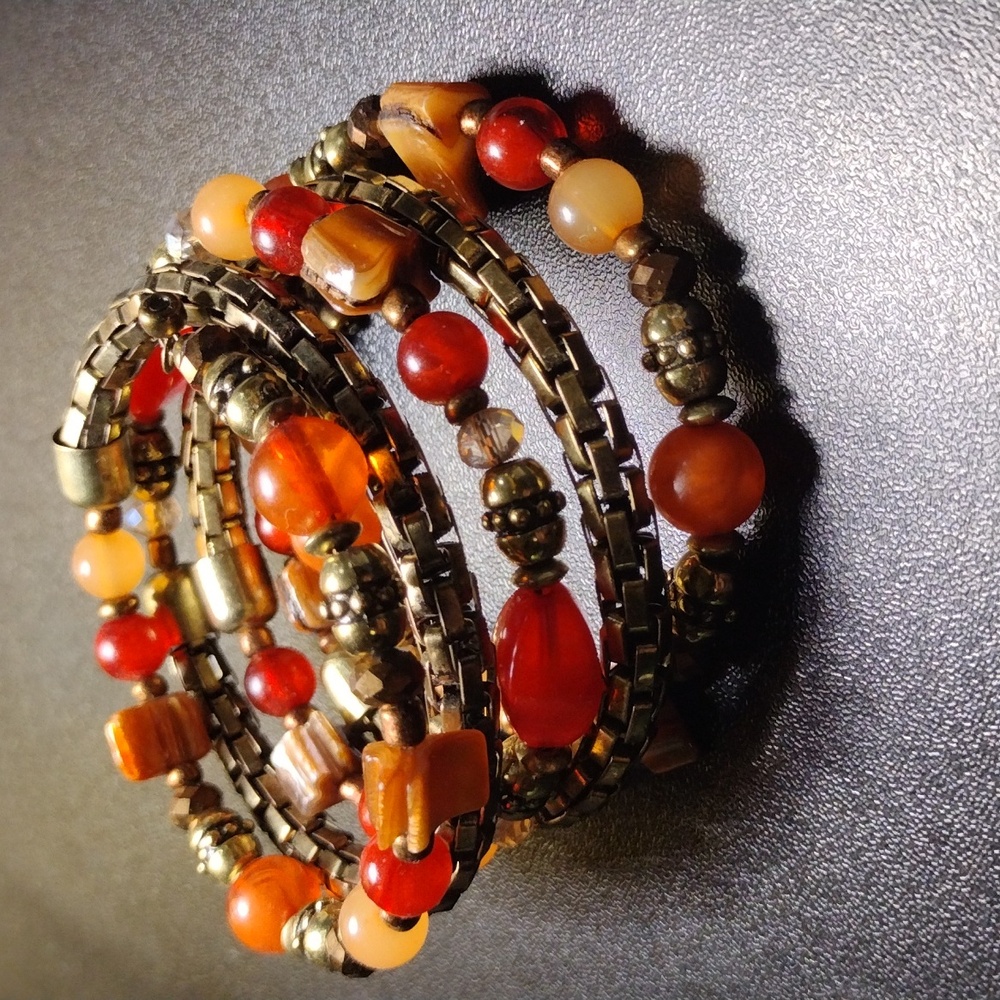 Vintage Spiral Bracelet -Fashion Jewelry- 5 Rows Of Items W/ Orange Color Tones